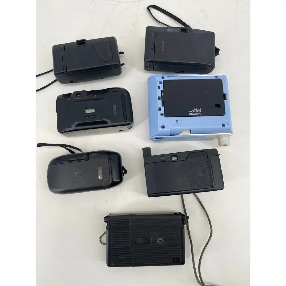 Lot of 7 Vintage 35mm Point & Shoot Camera Lot Olympus Canon Kodak Ricoh